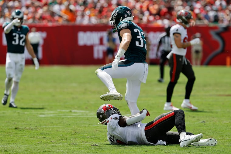 Eagles cornerback Cooper DeJean was flagged for taunting after stepping over Tampa Bay's Rachaad White on Sept. 28.