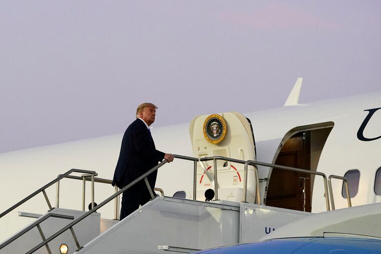 President Donald Trump boarding Air Force One at Reno-Tahoe International Airport on Sunday in Reno, Nev.