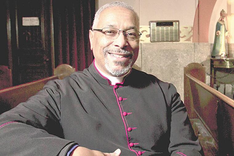 Monsignor Federico Britto brought two congregations and recent immigrants from the neighborhood together after the church formed in 2000. (Alejandro A. Alvarez/Staff Photographer)