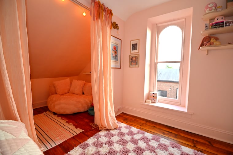 One of the bedrooms on the third floor of the home of John Giordano and Brooke Saylor.