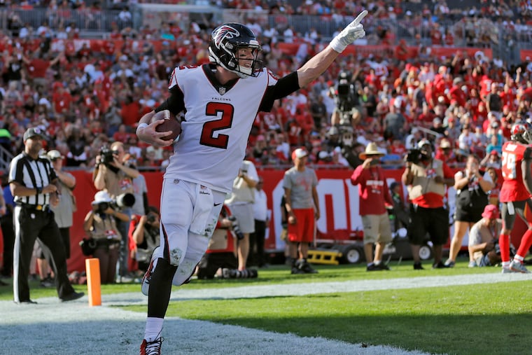 Atlanta Falcons quarterback Matt Ryan (2) celebrates after catching a 5-yard touchdown pass from Mohamed Sanu during the second half of a game against the Tampa Bay Buccaneers on Dec. 30. Ryan, a graduate of Philadelphia's William Penn Charter School, where he captained the football, basketball, and baseball teams, inspired a storyline in Wednesday, Jan. 9, series premiere of ABC's Philly-set comedy "Schooled."