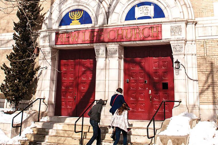 A trio of worshipers enters New Life Presbyterian Church on East Roosevelt Boulevard in Philadelphia. (Matthew Hall/Staff Photographer)