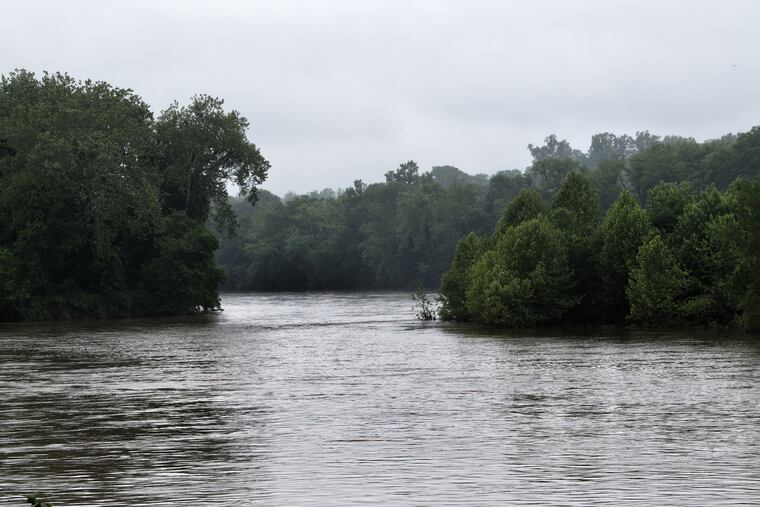 Trees under high waters in the Delaware River are shown in Yardley. Elsewhere in Bucks County, police are cautioning residents to keep out of the river, and to take proper safety precautions if they do decide to venture out.