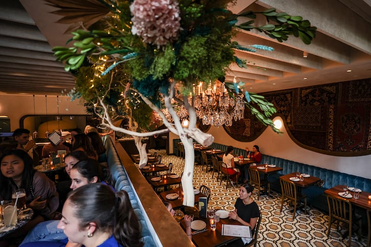 Over the past two years, Wilder restaurant in Rittenhouse, pictured in August, has started requiring credit card information to book parties of eight or more, and charges $30 per person if a large table cancels within 24 hours. This has led to fewer parties showing up with fewer people than expected, which can cost the restaurant.