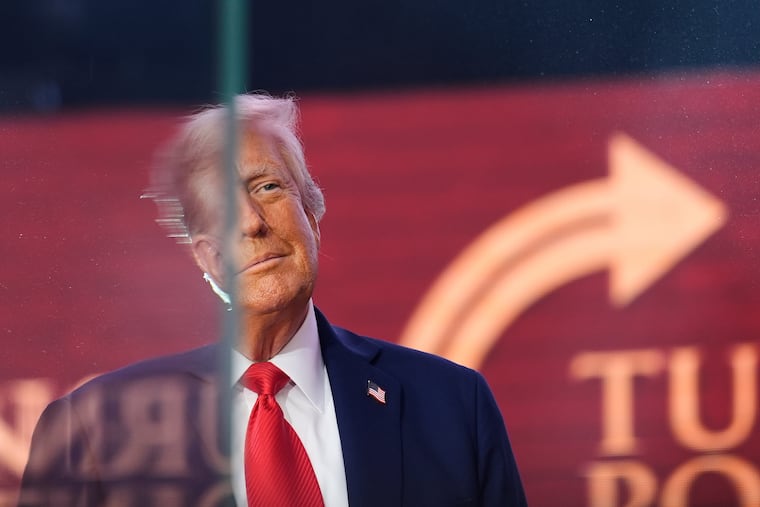 President Donald Trump prepares to speak Sunday at a memorial for conservative activist Charlie Kirk at State Farm Stadium in Glendale, Ariz.