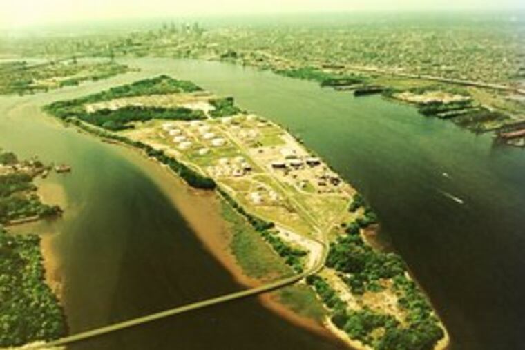 Petty's Island , shown here in a 1992 aerial photo courtesy of Citgo, the island's owner. For more than two years, an environmental controversy has swirled around what to do with the site.