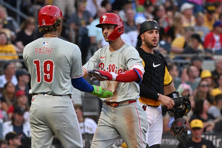 Trea Turner celebrates with Cristian Pache after hitting a two-run home run in the fourth inning.