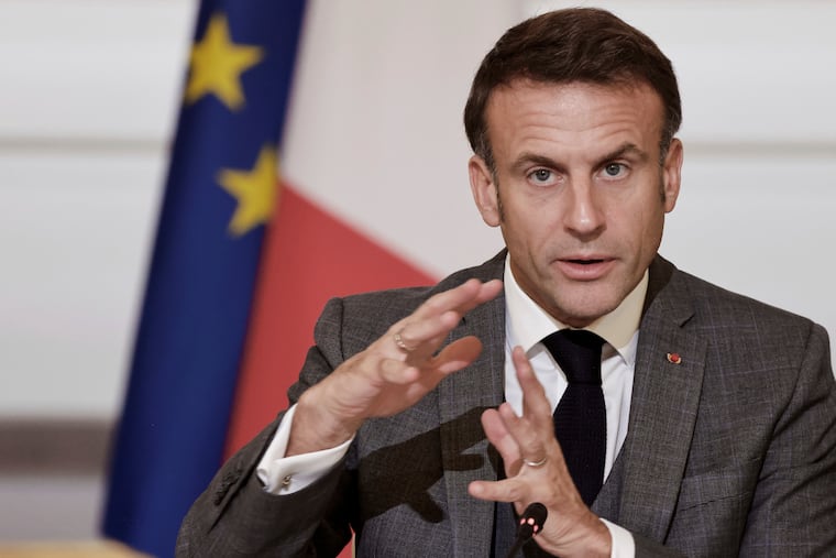 French President Emmanuel Macron speaks during a meeting with officials from Western and Arab nations, the United Nations and nongovernmental organizations at the Elysee Palace, in Paris, on Thursday.