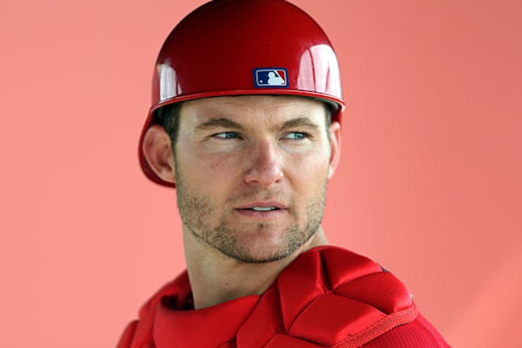 Lou Marson waits to catch during spring training. (David Maialetti/Staff Photographer)
