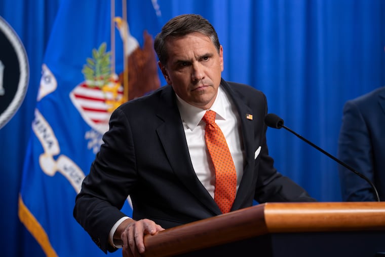 Acting Attorney General Todd Blanche holds an April 7 news conference at the Justice Department.