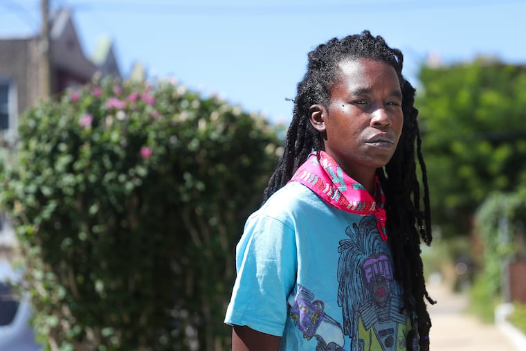 Camae Ayewa, a North Philly poet and musician who performs as Moor Mother, outside her home in the city's Brewerytown neighborhood. She has a new album called "Circuit City."