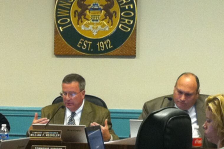 Haverford Board of Commissioners President William Wechsler (left) said he learned to scuba dive in the Llanerch Quarry after it had filled with water. Township and school district officials hope converting the area into a shopping complex will result in major financial gains.