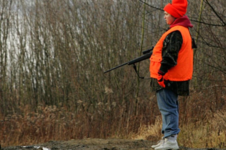 A deer hunter in Moraine State Park, in Butler County. Legislation being debated in a House committee would not open all Sundays to hunting. Instead, the state Game Commission would decide on the Sundays. (Keith Srakocic / Associated Press, File)