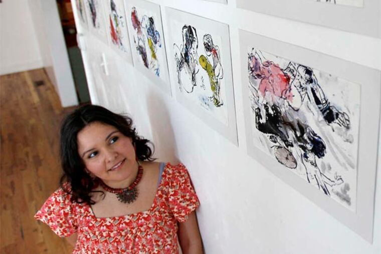 Betsy Casanas is now painting murals not only in Philadelphia but in Ireland, Cuba and Ecuador, among other places. (DAVID MAIALETTI / STAFF PHOTOGRAPHER)