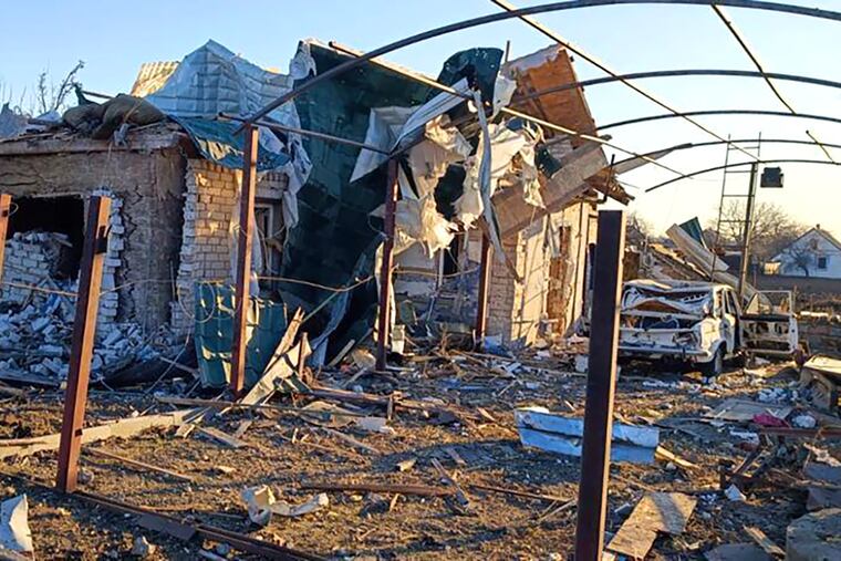 A damaged building and car after a Russian strike in the village of Novosofiivka, in the Zaporizhzhia region of Ukraine, on Monday.