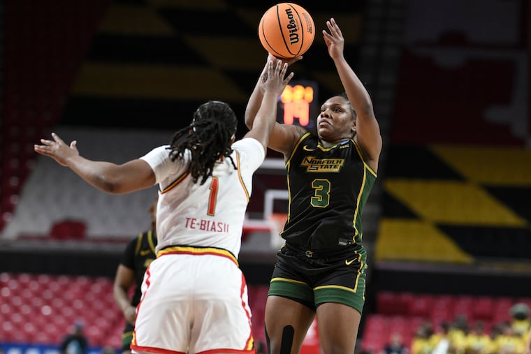 Diamond Johnson (right) in action with Norfolk State during this year's NCAA Tournament, her second straight with the Spartans.