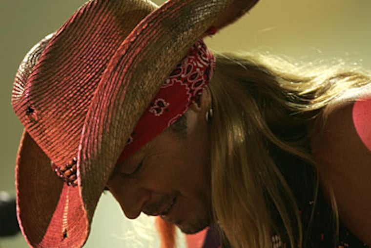 Poison's Bret Michaels. Poison, Cheap Trick and Def Leppard kicked off their U.S. tour Tuesday night at the Susquehanna Bank Center in Camden. ( David Swanson / Staff Photographer )