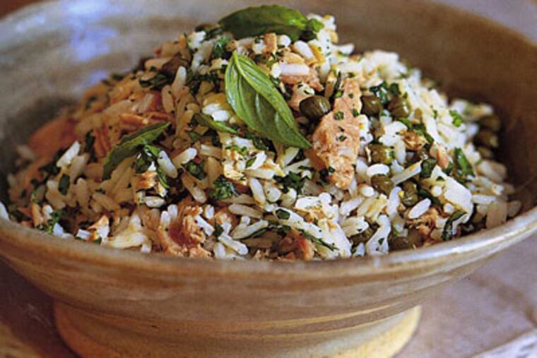 You don’t even need a recipe, it’s so easy and versatile, but here’s one: Rice Salad With Tuna, Capers. (The Williams-Sonoma Cookbook)