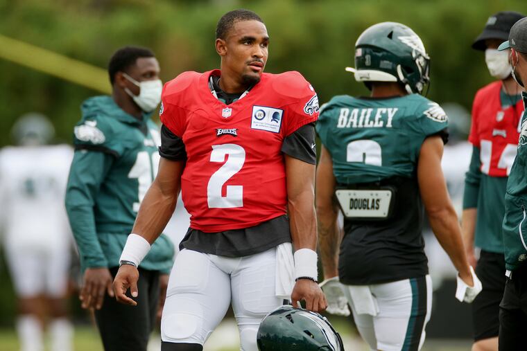 Rookie quarterback Jalen Hurts (2) adds some mystery to the Eagles' roster. How will they use him?