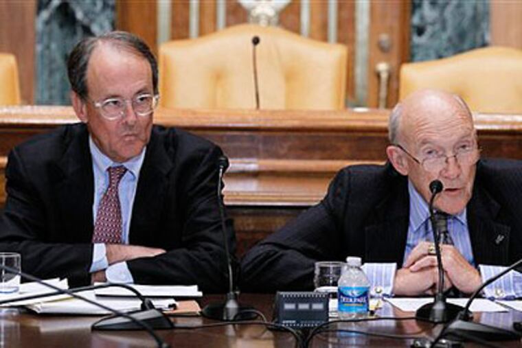 Erskine Bowles, left, accompanied by former Wyoming Sen. Alan Simpson, co-chairmen of President Barack Obama's bipartisan deficit commission, take part in a news conference on Capitol Hill in Washington on Wednesday0. (AP Photo / Alex Brandon)