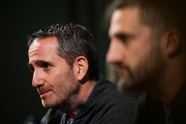 Eagles GM Howie Roseman (left) and coach Nick Sirianni listen to a question during a news conference on Wednesday.