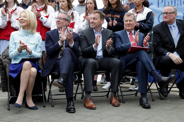 Left to right: Amy Gutmann, president of the University of Pennsylvania; John Anderson Fry, president of Drexel University; Mark C. Reed, president of Saint Joseph's University; Richard M. Englert, president of Temple University; and Mayor Jim Kenney attend an event to announce the Schuylkill River Dredge Project.