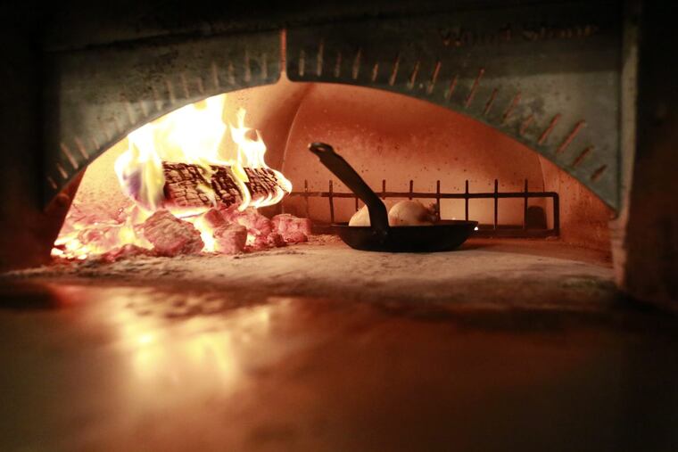 The brined chicken roasting at Vernick, a top pick for end-times dining.