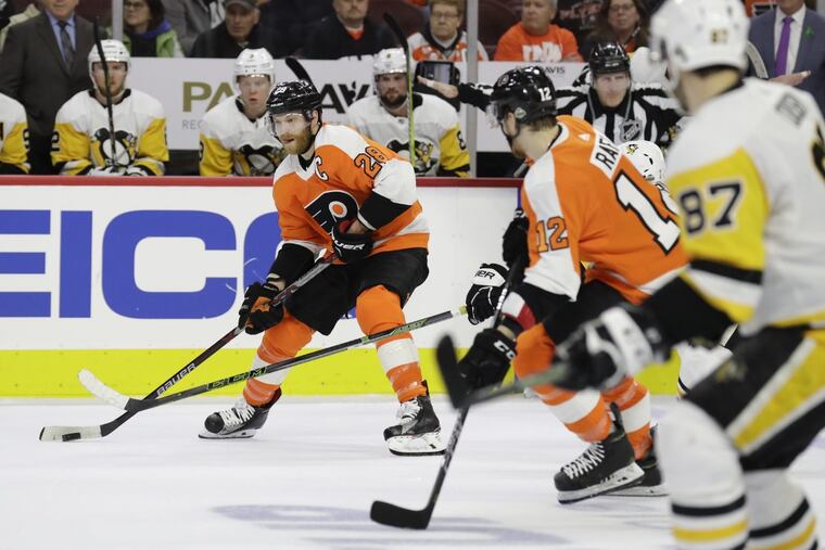 Flyers center Claude Giroux said the team needs to put its Game 3 5-1 blowout loss to the Penguins at home on Sunday behind them. YONG KIM / Staff Photographer