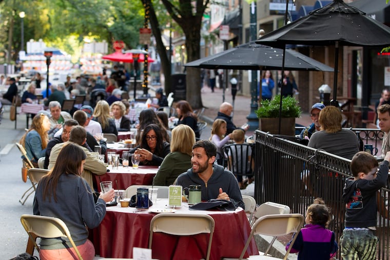 The outdoor dining on Gay Street during a First Friday event in 2020. This year, restaurant owners say they faced hurdles getting their outdoor dining permits, arguing it cost them revenue as the first nice days of spring warmed the borough.
