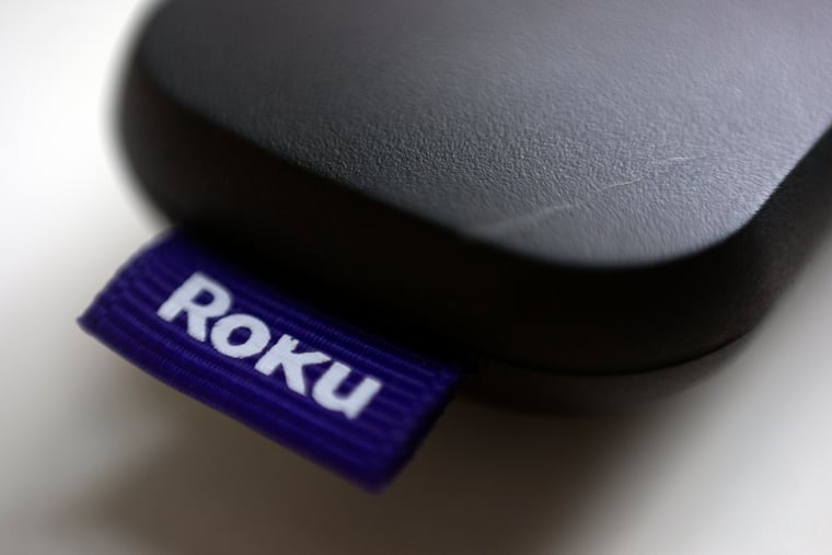 FILE - The Roku logo is affixed to a remote control in Portland, Ore., Aug. 13, 2020.