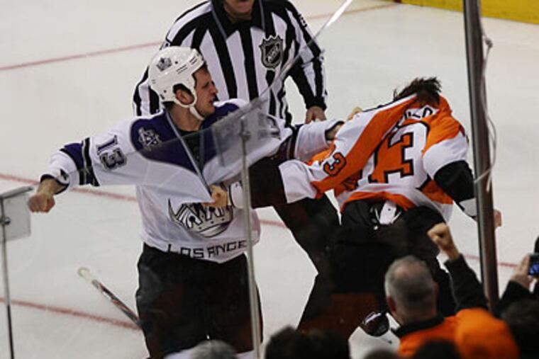Sunday's Kings-Flyers game featured a few old-fashioned hockey haymakers. (David M Warren/Staff Photographer)