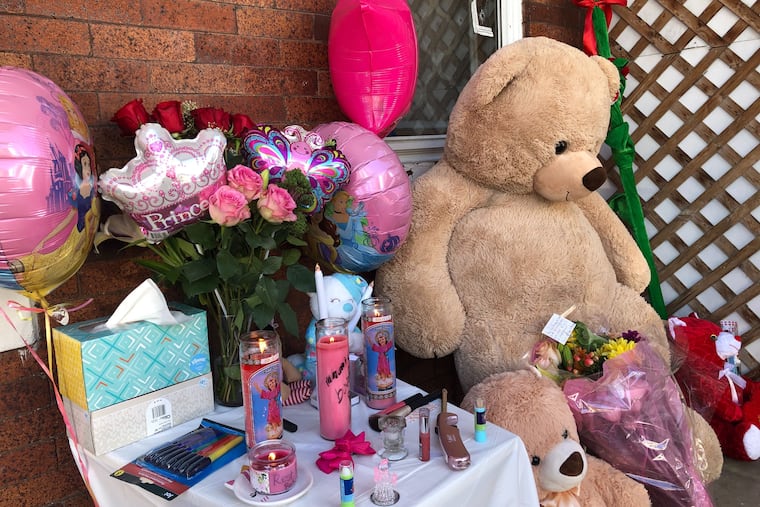 A memorial is set up on Oct. 21, 2019, for a 2-year-old girl who was fatally shot in Philadelphia.