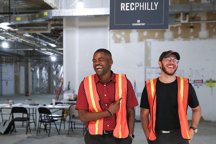 William Toms, left, and David Silver pose for a portrait inside their new space at Ninth and Market Streets that is currently under construction in Center City, Philadelphia on Thursday, July 25, 2019. REC Philly, a coworking space for creatives, has just secured $3 million in funding.