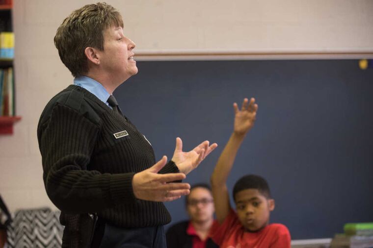 Police Officer Wendy McGrody gives a D.A.R.E. lesson to a fifth grade class at William Cramp Elementary School at 3449 N. Mascher St.