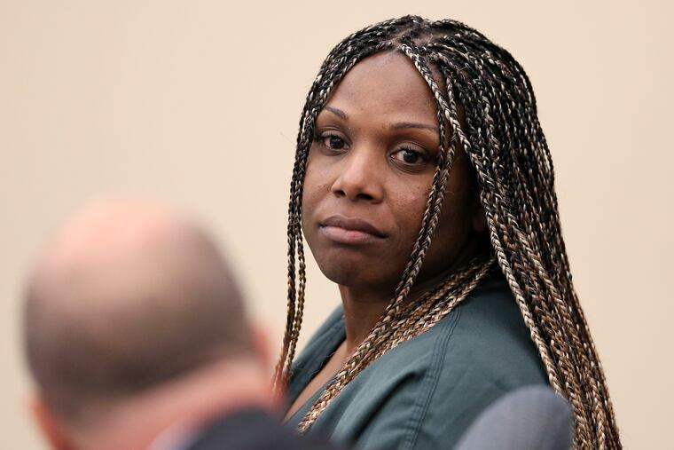 Chanel Barnes of Philadelphia looks backward during her Gloucester County Superior Court detention hearing in Woodbury, N.J., on Thursday, June 14, 2018. Barnes is accused of shoplifting from a Marshalls store in Deptford on Saturday, an incident that ended with a police officer fatally shooting LaShanda Anderson as the two allegedly attempted to flee in a car.