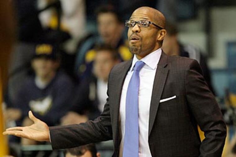 Jerome Allen's Penn Quakers defeated Brown in overtime, 80-78, on Saturday. (Yong Kim/Staff file photo)