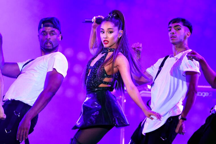 Ariana Grande, center, performs at Wango Tango in Los Angeles in June.