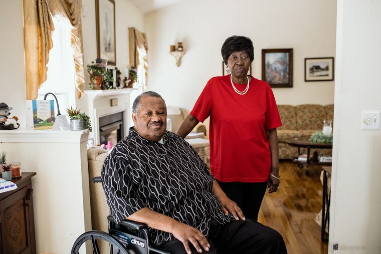Thomas Greene with his wife, Bluizer, at their home in Oxford, Pa. After Thomas had a procedure on his leg, the anesthesia providers billed Medicare late, and he was sent to collections for the debt.