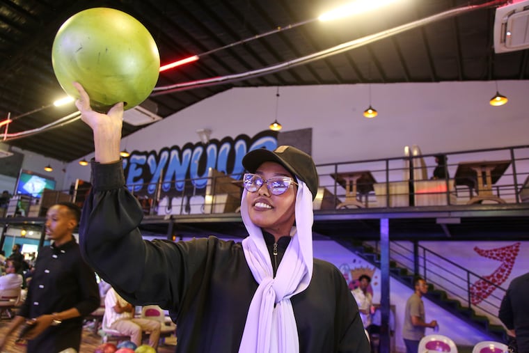 A Somali woman bowls at the Feynuus Bowling Center in Mogadishu, Somalia, on Jan. 15.