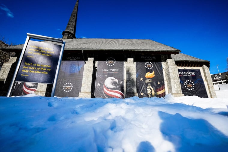 Posters cover the church hosting the United States House on the eve of the start of the Annual Meeting of the World Economy Forum in Davos, Switzerland, Sunday, Jan. 18, 2026.