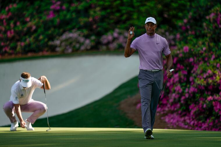 Tiger Woods waves on the 13th hole during the third round for the Masters golf tournament Saturday, April 13, 2019, in Augusta, Ga. (AP Photo/David J. Phillip)