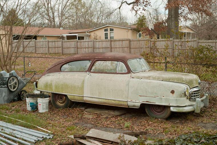 "Nash Parked in Back Yard, Georgia," one of the Jack Carnell photographs on display at Haverford College's Atrium Gallery. Carnell's photos are focused on places and things, not people.