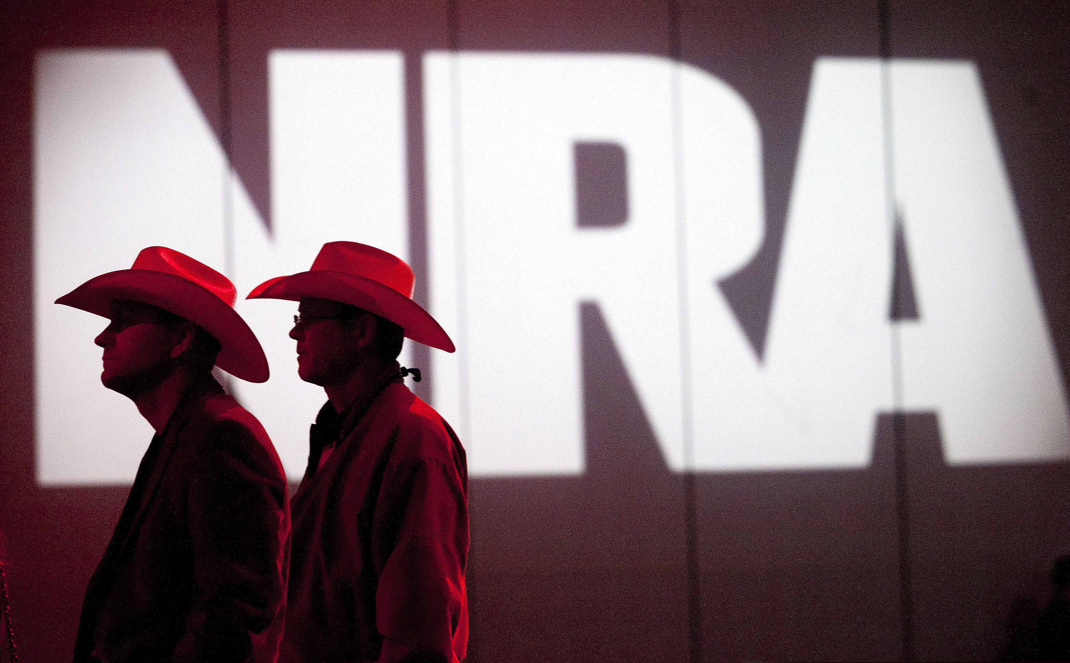 In this May 4, 2013, file photo, NRA members listen to speakers during the NRA Annual Meeting of Members at the National Rifle Association's 142 Annual Meetings and Exhibits in the George R. Brown Convention Center in Houston.