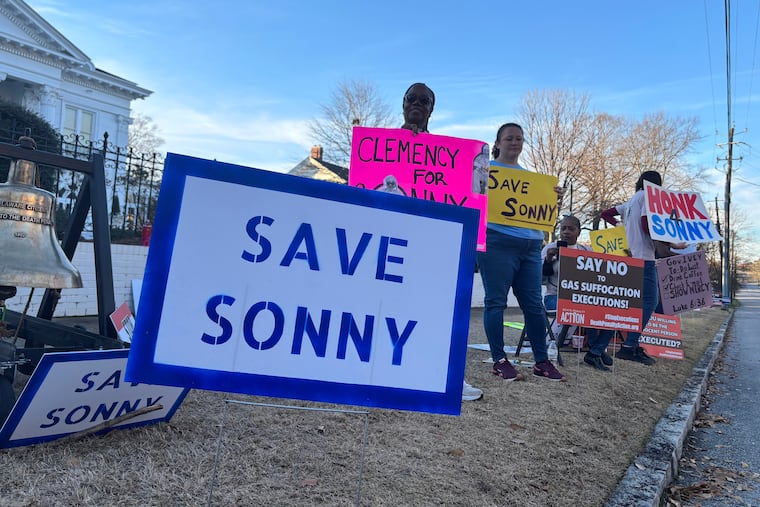 People gather outside the Alabama Governor's Mansion in Montgomery, Ala., on Feb. 16, 2026, to urge Gov. Kay Ivey to grant clemency to Sonny Burton, who was scheduled to be executed on March 12.