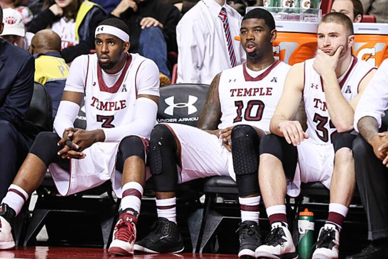 Temple's bench watches as Louisville beats them, 82-58. (Steven M. Falk/Staff Photographer)
