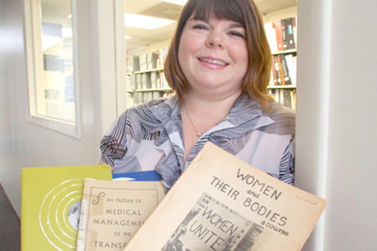 "Students can look at these things and see . . . how our attitudes have changed," archivist Molly Wolf says. (Ed Hille / Staff Photographer)
