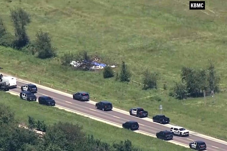 This video frame grab provided by KMBC-TV shows an aerial view of the crash scene near the Butler Memorial Airport in Butler, Mo., Sunday, June 14, 2026.