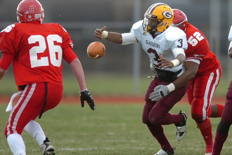 Glassboro quarterback Tim Breaker (3) had the ball knocked loose by Paulsboro's Corey Gilchrist in the Nov. 22 Group 1 semifinal. Despite the momentary setback, Glassboro went on to win, 21-13, to reach today's final against Penns Grove.