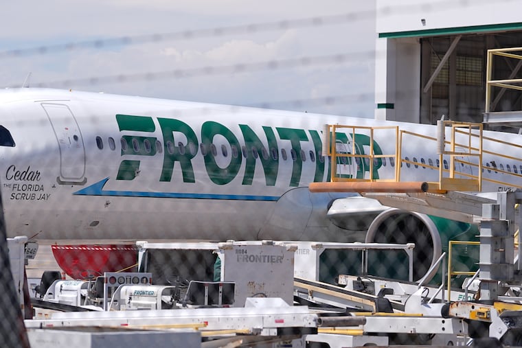 A Frontier Airlines jetliner at Denver International Airport.