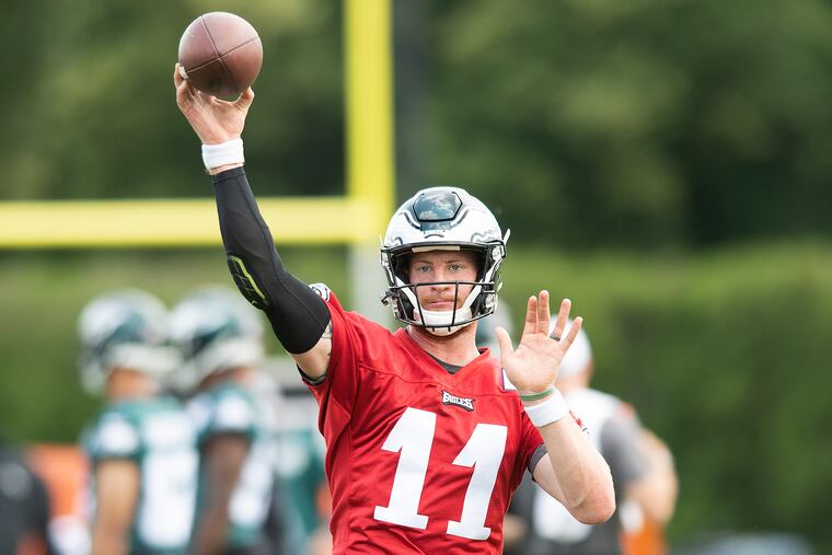 Carson Wentz throws the football during practice at the Novacare Complex.